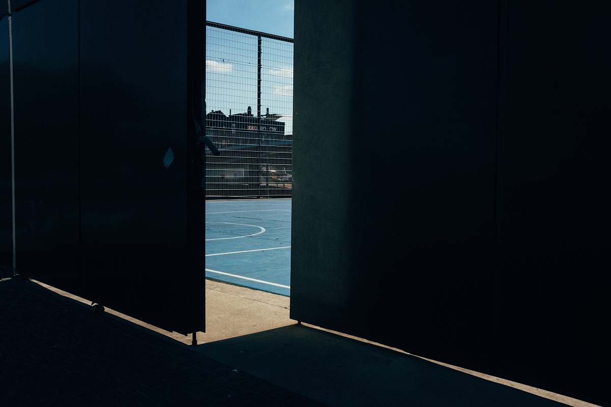 team sport opened wooden door team